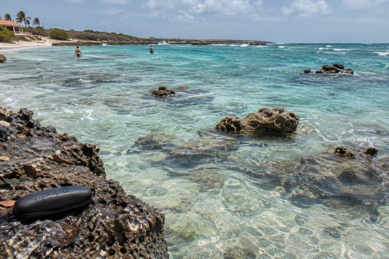Calm turquoise water over a shallow reef close to shore